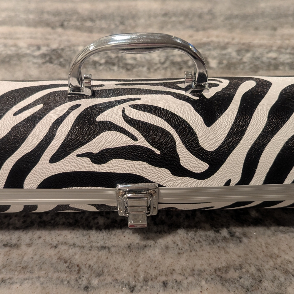 Zebra Print Wine Purse with Silver Handle with Bottle Opener. (Wine Not Incl)